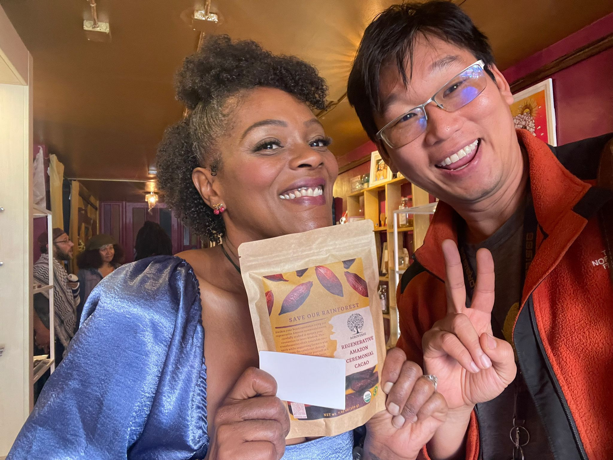 Partners holding Agroverse ceremonial cacao bags