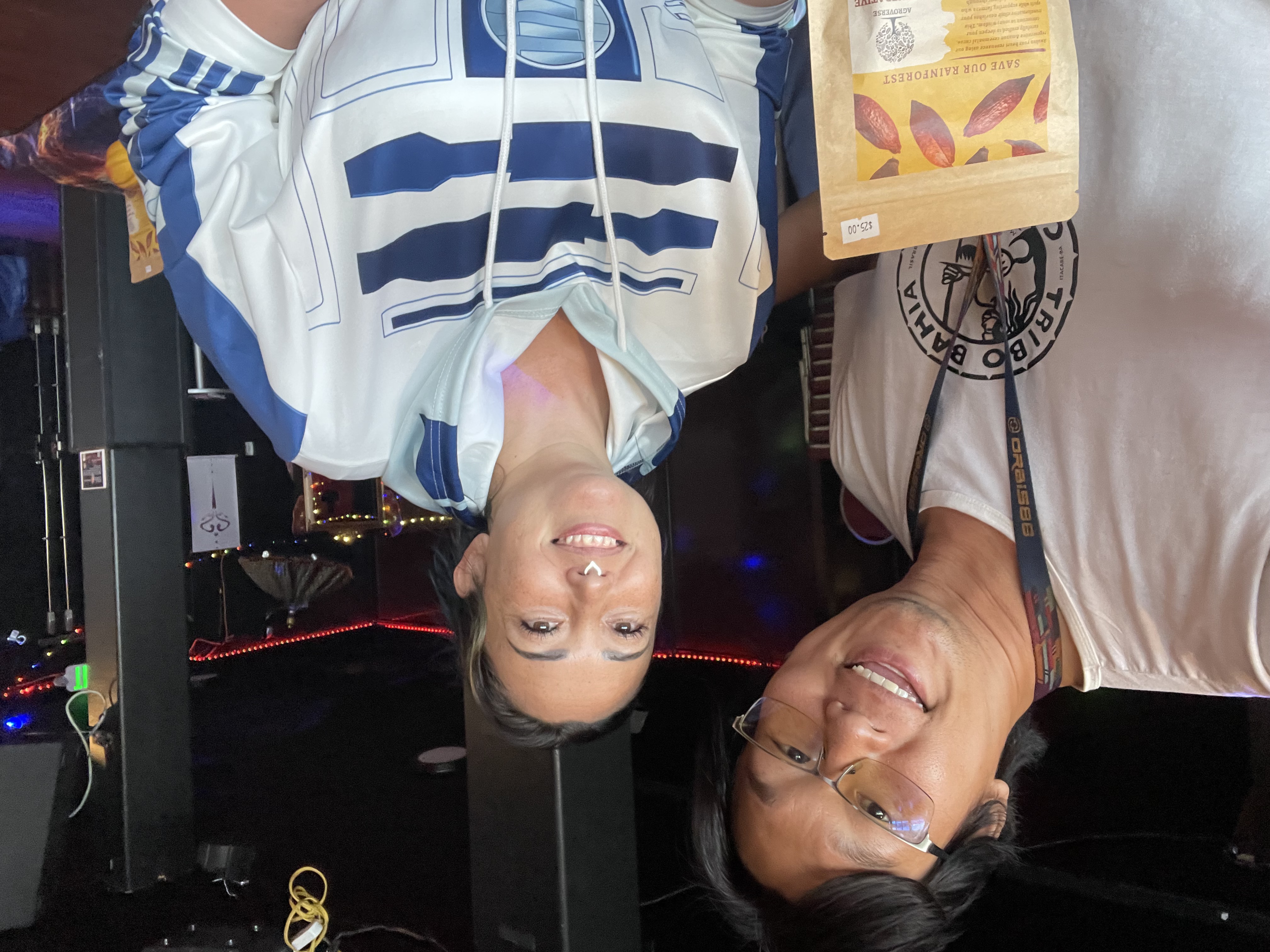 Jae Nice and Gary holding Agroverse ceremonial cacao bags